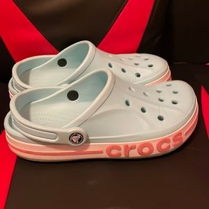 Women’s size 8, baby blue and pink crocs